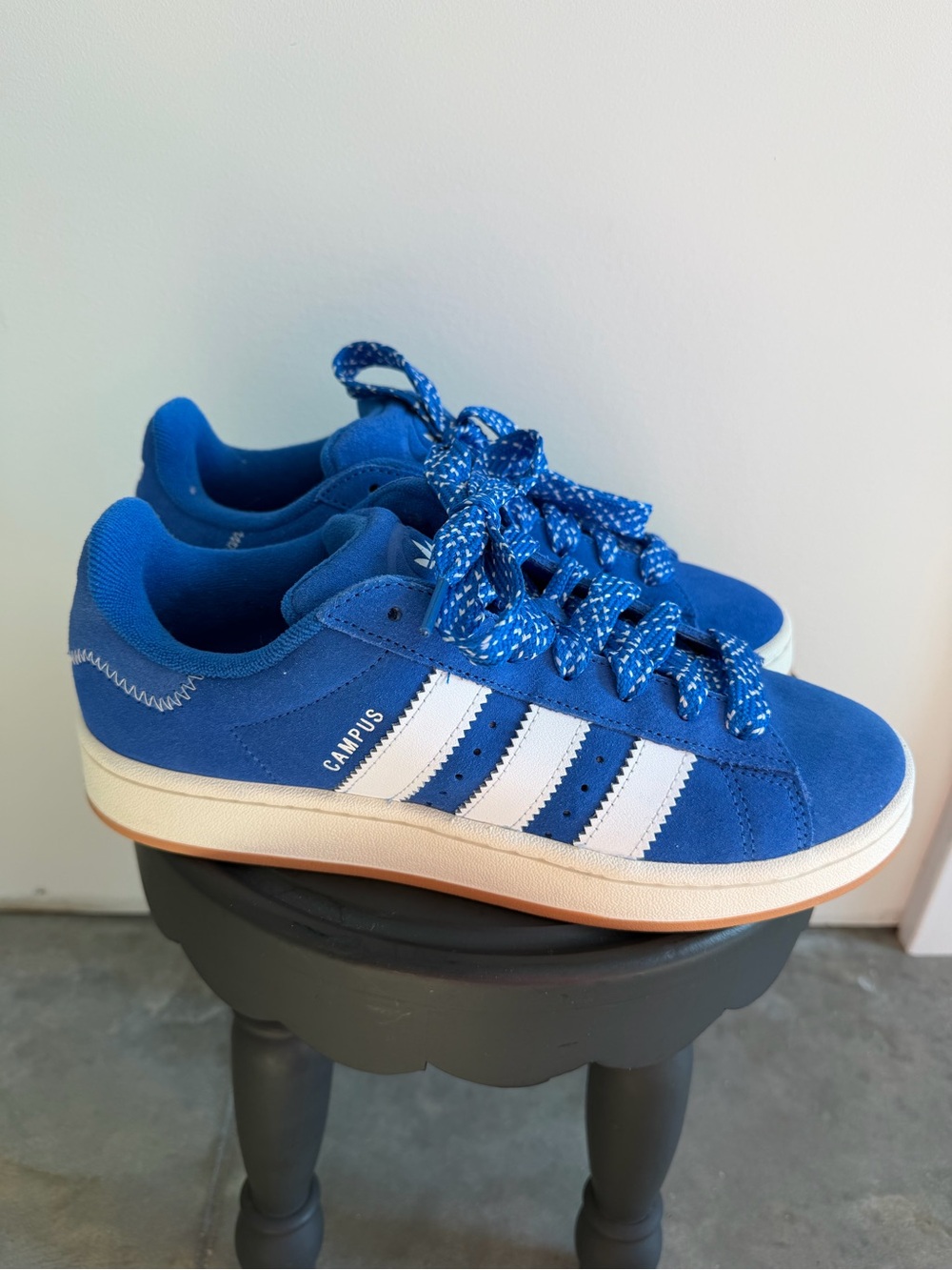adidas women’s Blue Suede Sneakers with White Stripes